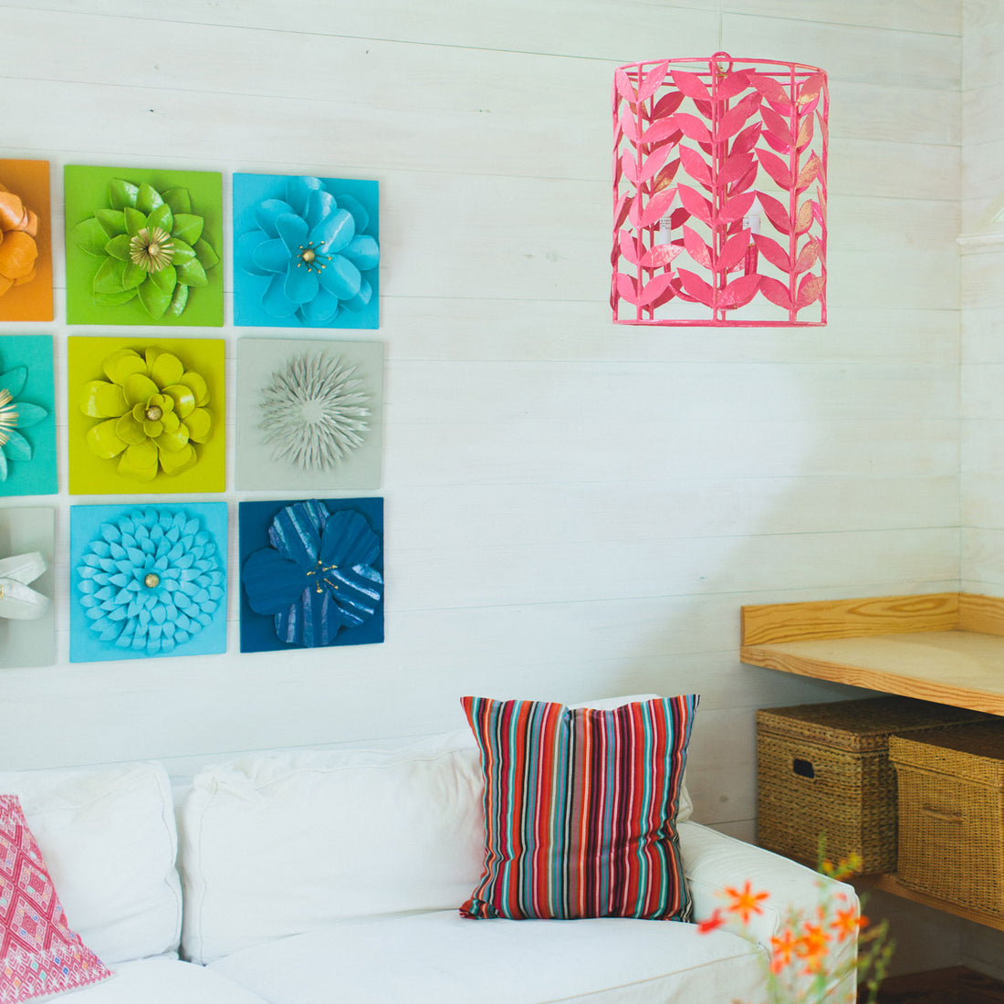 Adelaide Chandelier in Pink Paper Mache hanging in living room