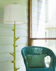 Funky Floor Lamp in yellow papier mache on pretty porch