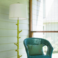 Funky Floor Lamp in yellow papier mache on pretty porch