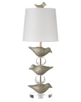 Gray Robin Staak table lamp with stacked papier mache birds and balls